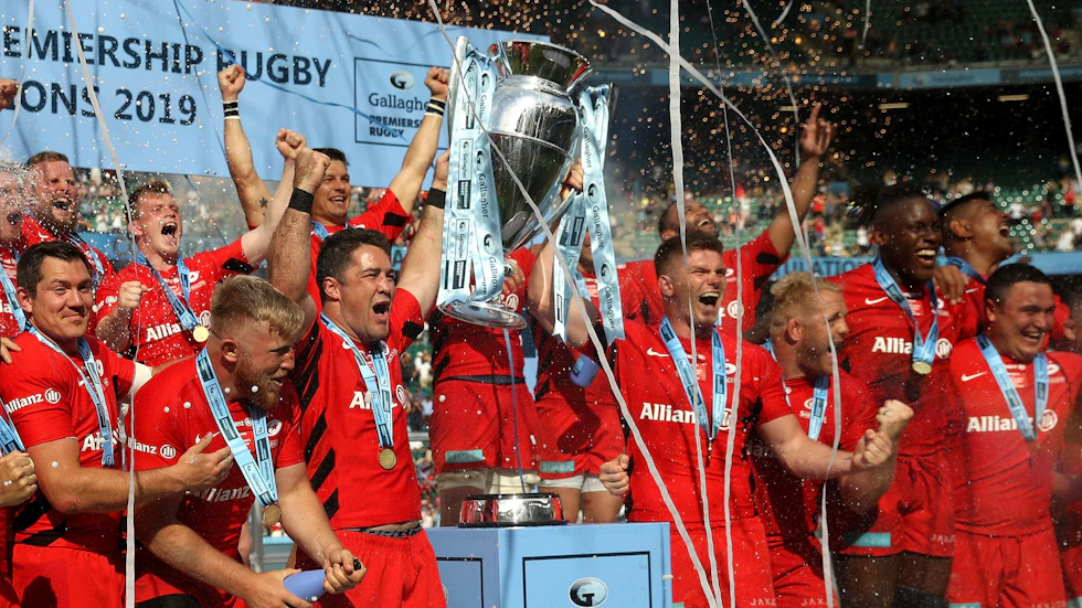 The 2018/19 Premiership champions Saracens hold aloft the trophy.